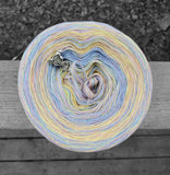 Pastel yellow, pink, purple, and blue variegated yarn