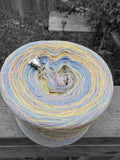 Pastel yellow, pink, purple, and blue variegated yarn