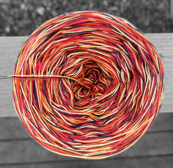 black, yellow, orange, red and burgundy variegated yarn
